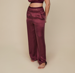 Model wearing the Silky Sleep Pant in the color Sangria.