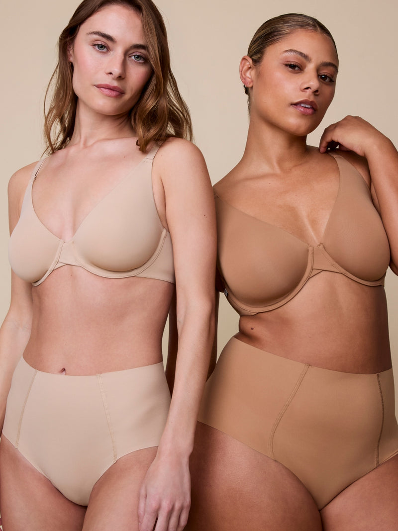 Two models standing side by side in the Harper Wilde Base Unlined Bra and Base T-Shirt Bra with matching No-Show Highwaist Underwear.