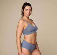 Woman wearing the Bliss Triangle Bralette in the color Steel