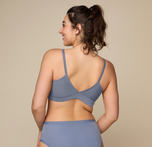 Woman wearing the Bliss Triangle Bralette in the color Steel
