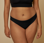 Woman modeling the bliss bikini underwear in black