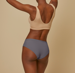 Woman wearing the bliss hiphugger in color steel