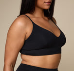 Woman wearing the Cloud Cotton Triangle Bralette in the color Black