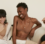 Woman wearing the Base Unlined Bra in the color Brown