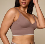 Woman wearing the Lounge Triangle Bralette in the color Oyster